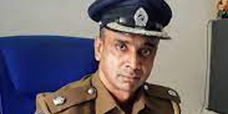 ප්‍රභාකරන්ටත් ගහලා පොලිසියේ කොන්ද කෙළින් කළ ASP එරික් කව්ද? පොලිසියේ කොන්ද කඩා එරික් මාරු කළ ඇමැති කව්ද?