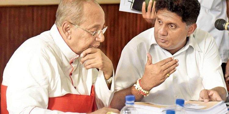 සජිත් හදිසියේම ගිහින් කාදිනල් හිමියන් හමුවෙයි! පාස්කු ප්රහාරයේ මහමොළකරුවන් ගැනත් කතා කරයි! (VIDEO)