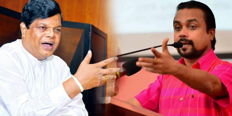 ‘නුවරඑළිය – හැටන් මාර්ගයේ සිදුවූ මාරක රිය අනතුර ගැන කියන්නයි මම මේ කතා කරන්නේ…’ – ඇමැති බන්දුල. ‘මේ මොකක්ද? රිය අනතුරු වෙන එකක් ගානේ ඇමැතිවරු පාර්ලිමේන්තුවේ ප්‍රකාශ කරන්න ගියොත් වෙන වැඩක් නැතිවෙනවා…’! විමල් මැදට පනී! ආයෙත් උණුසුම්! (VIDEO)