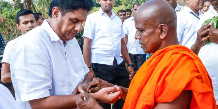 ජනපති සිහින තියෙන අය ‌රට වටේ ගිහින් දැන් දෙන බොරු පොරොන්දු! 2019දි රටම රවට්ටපු අය දුන් බොරු පොරොන්දු! ජනතාව බොරු පොරොන්දු තේරුම් ගත යුතු විදිහ! සජිත් දොඩම්ගස්ලන්ද ශෛලතලාරාමයේ චෛත්‍ය විවෘත කරයි! VIDEO & PHOTOS I Sri Lanka Latest News