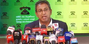 අමුඩ ලේන්සුව-උදලු තලය-පොහොර-තේ දලු-රබර්-කොප්පරා-ඩීසල්-ගෑස්-පෙට්‍රල්-පෝෂණ ආහාර-දේශීය පොල් කිරි-යන්ත්‍රෝපකරණ-දුරකථන-ඉලෙක්ට්‍රොනික් උපකරණ-වෛද්‍ය උපකරණ-ලොරි-ට්‍රක්-ඇම්බියුලන්ස්! අලුතෙන්ම 18%ක් බදුගහන්න යන බඩු ලයිස්තුව හර්ෂ එළියට දමයි! ආණ්ඩුව කොළේ වහලා ගහන්න යන ගේමත් හෙළිකරයි!  VIDEO I Sri Lanka Latest News