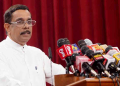 රට බංකොලොත් වුණේ… විදුලි බිල වැඩි වුණේ කොටින්ට ආයුධ දුන්න හින්දලු! මිනිස්සු දරාගන්න බැරි විදුලි බිල ගැන විපක්ෂනායක ප්‍රශ්න කරද්දී හරි අපූරු ආර්ථික විග්‍රහය කළේ ආණ්ඩුවේ රාජ්‍ය ඇමැති කෙනෙක් වුණු ජගත් පුෂ්පකුමාරයි! අහල බලන්න මේ ආර්ථික විග්‍රහය! VIDEO I Sri Lanka Latest News