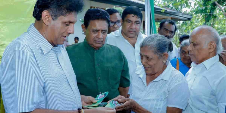 සජබ සාමාජික ප්‍රවර්ධන වැඩසටහනේ පස්වන අදියර අරන් සජිත් හිඟුරක්ගොඩට යයි! ග්‍රාම සේවා වසම් 14,021ක්… කුඩා ගම්මාන 50,964ක්… රටම ආවරණය කරන වැඩක්! ආණ්ඩුව දැන් දෙබිඩ්ඩෝ නාට්ටිය පෙන්වනවා! එදා බීලූණු ආනයනය නරකයි! අද ආනයනය හොඳයි! PHOTOS & VIDEO I Sri Lanka Latest News