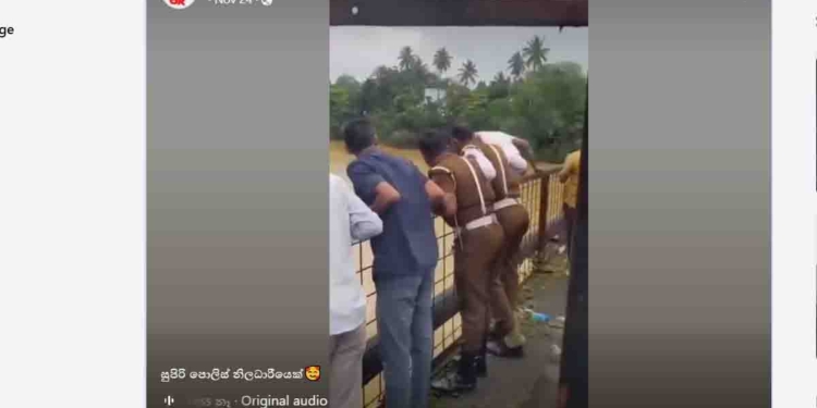 මෙන්න සුපිරි පොලිස් නිලධාරියෙක්! එකෙන්ම රෙස්පෙක්ට් මහත්තයෝ! මහා ගංවතුරේ ගහගෙන යන කෙනෙක්ව බේරගන්න තමන්ගේ ජීවිතේ ගැනවත් නොහිතා නිල ඇඳුම ගලවලා පාලමෙන් ගඟට පැන්නා!  VIDEO I Sri Lanka Latest News